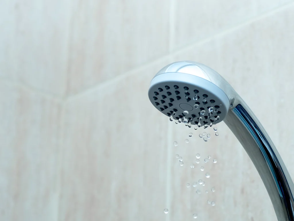 Shower head with low water pressure causing weak water flow in the shower
