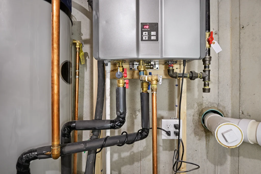 heat pump water heater vs tankless