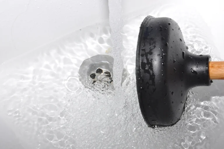 Clogged Shower Drain: Causes, Signs & When to Call a Pro